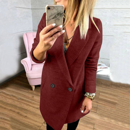 Women's extra-long, tailored coat with elegant lapels and practical pockets NOVAE