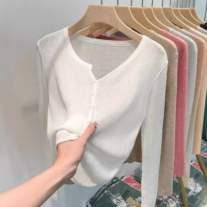 Women's figure-hugging cardigan with elegant button closure and fine ribbed texture NOVAE