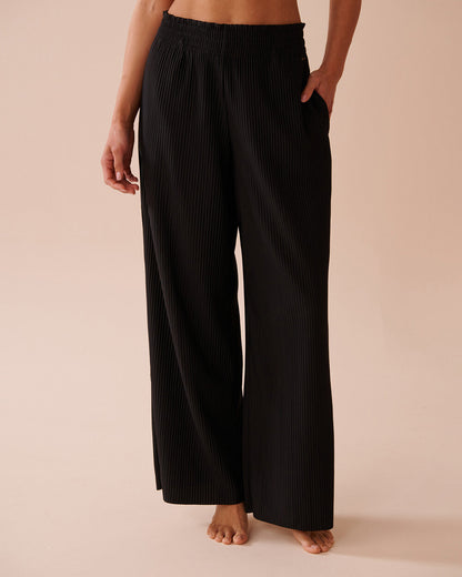Women's wide-leg pleated trousers with elasticated waistband and side pockets NOVAE
