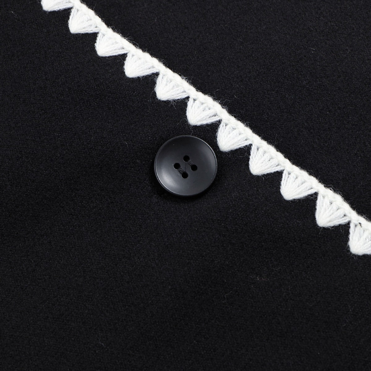 Women's elegantly cut blazer jacket with contrasting details and wide-leg trousers NOVAE