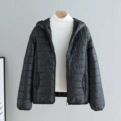 Women's quilted transitional jacket with practical pockets and hood NOVAE