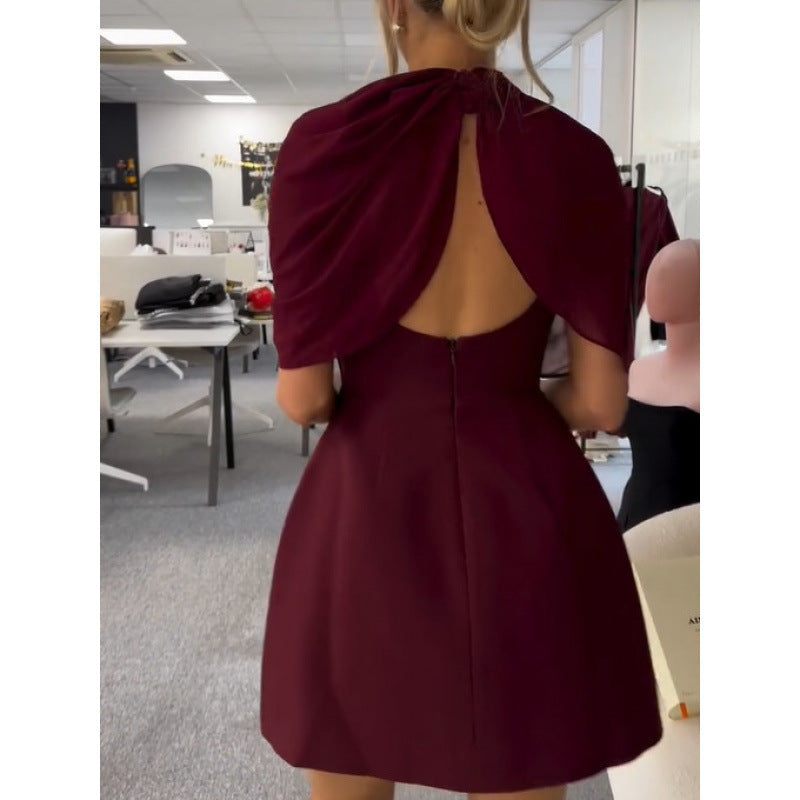 Women's dress with elegant halter neck design and flowing fabric NOVAE